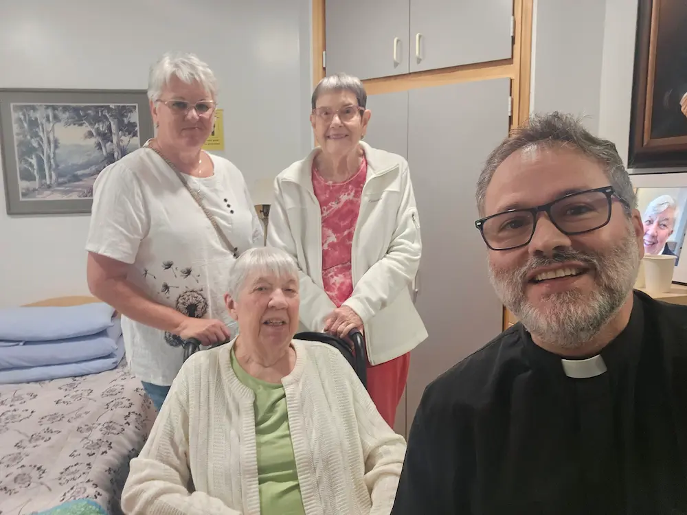 3 ladies with Fr. Rogério